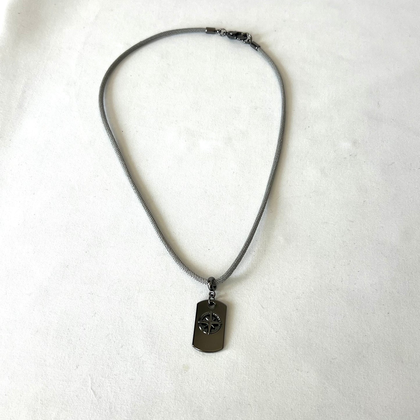 Trail Compass Tag - Mário Britto