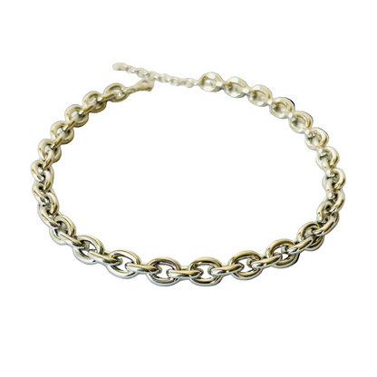 Silver chain necklace on a white background