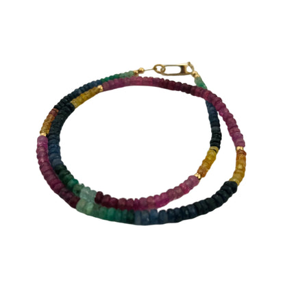 Multicolored beaded necklace on a white background